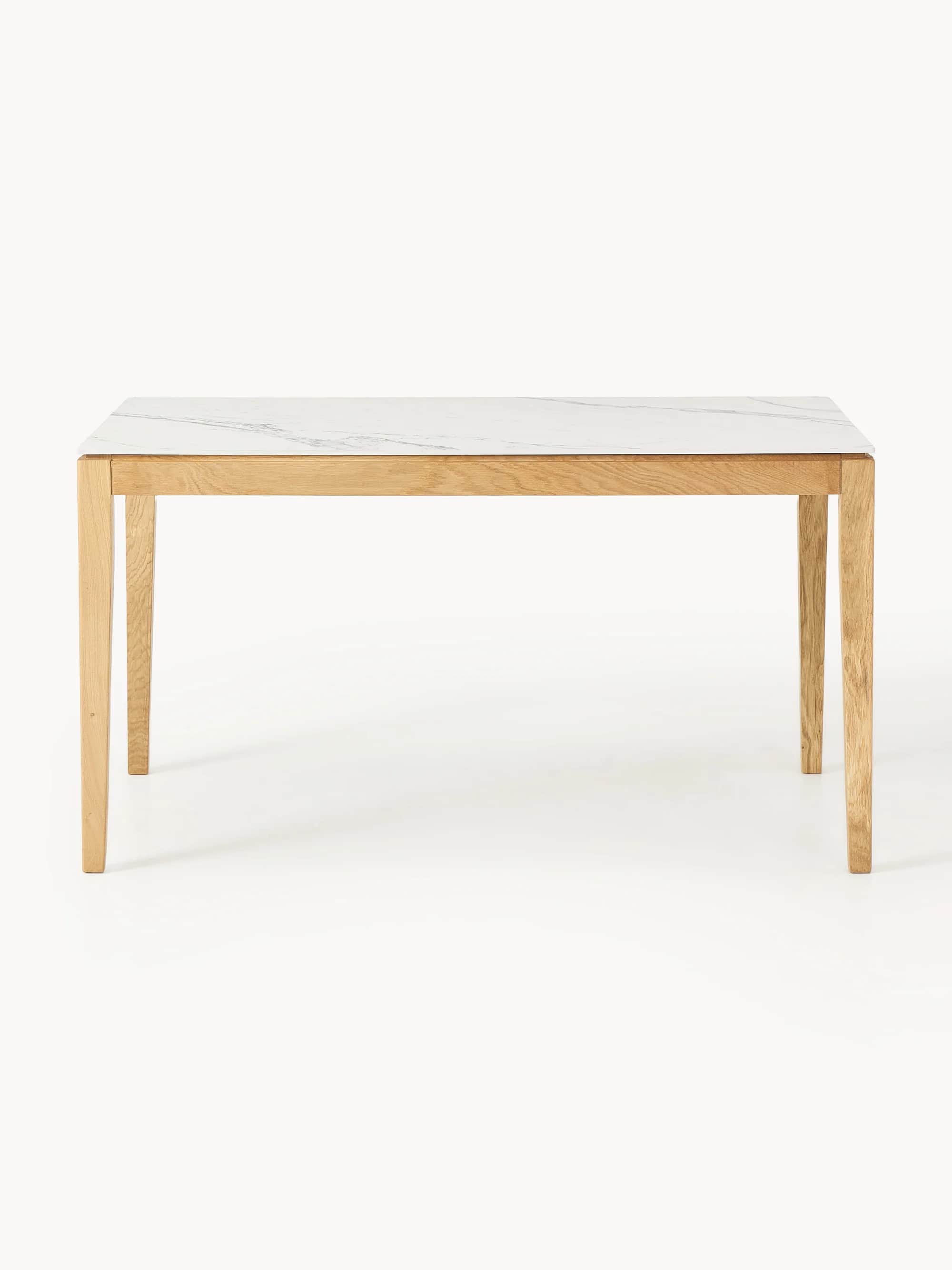 A modern rectangular dining table featuring a white top with grey marble-like veining, supported by… — free OBJ 3D model
