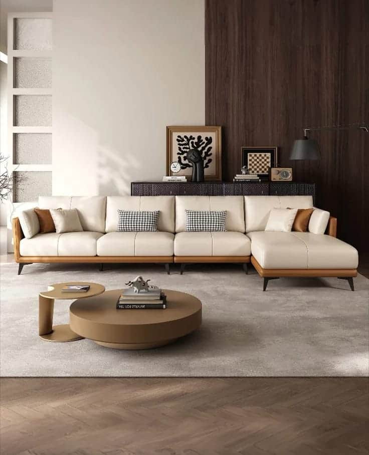 A modern sectional sofa featuring a chaise lounge. The main body of the sofa is upholstered in a lig… — free SKP 3D model