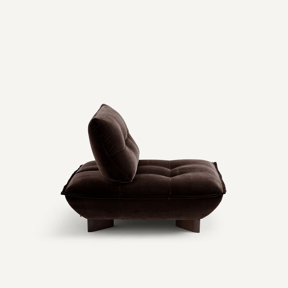 A low-profile, tufted sofa with a deep seat and a single, adjustable backrest. The sofa features a rounded front edge and is supported by dark, rectangular wooden legs. The upholstery appears to be a plush velvet fabric. — 3D model
