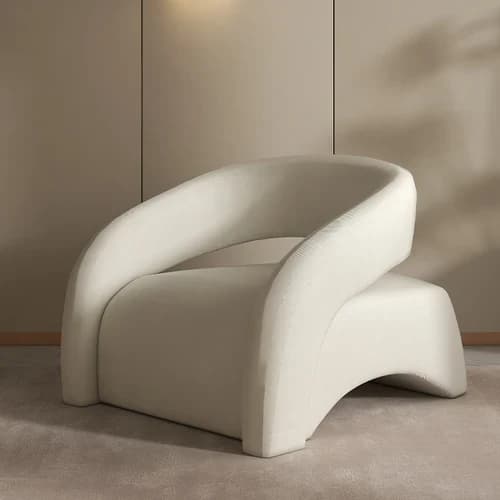 A modern, sculptural accent chair featuring a seamless, U-shaped backrest and armrests that flow into a solid, block-like base. The chair is fully upholstered in a textured, off-white or cream fabric, presenting a monolithic and minimalist aesthetic. — 3D model