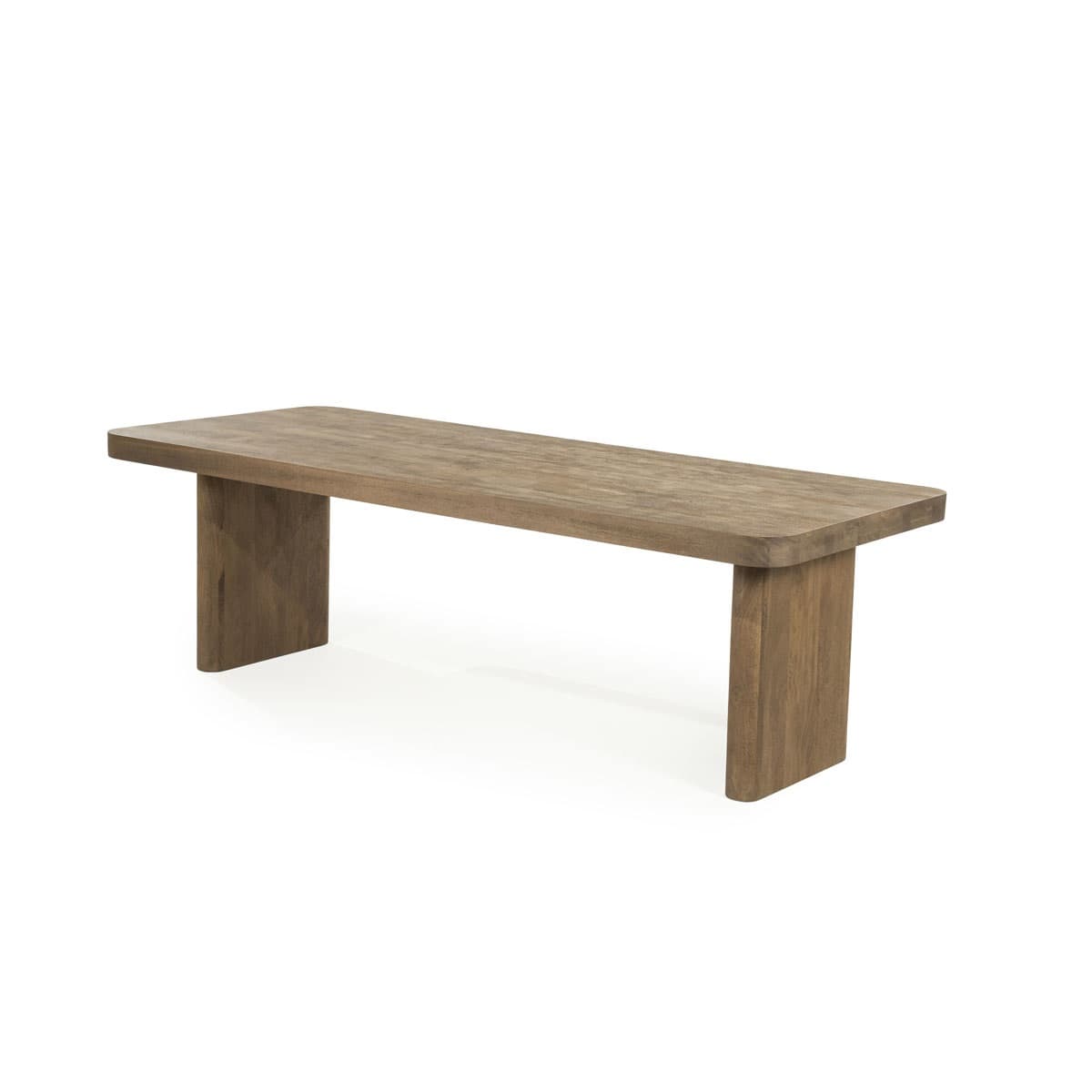 A long, rectangular wooden bench with a thick, solid top and two rectangular legs that are integrated into the underside of the top. The bench has a minimalist design with clean lines and rounded edges on the top surface. The wood grain is visible, suggesting a natural finish. — 3D model