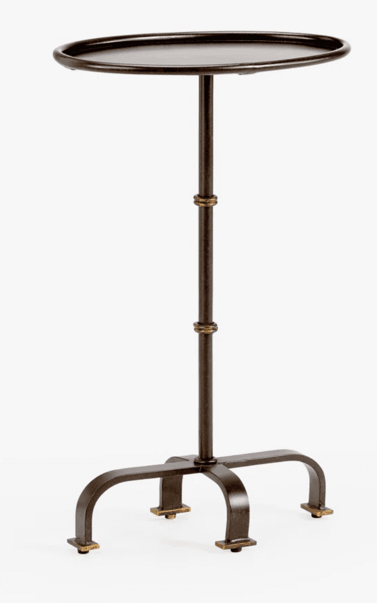 A dark bronze metal accent table featuring a round, shallow tray top, a slender central pedestal, an… — 3D model