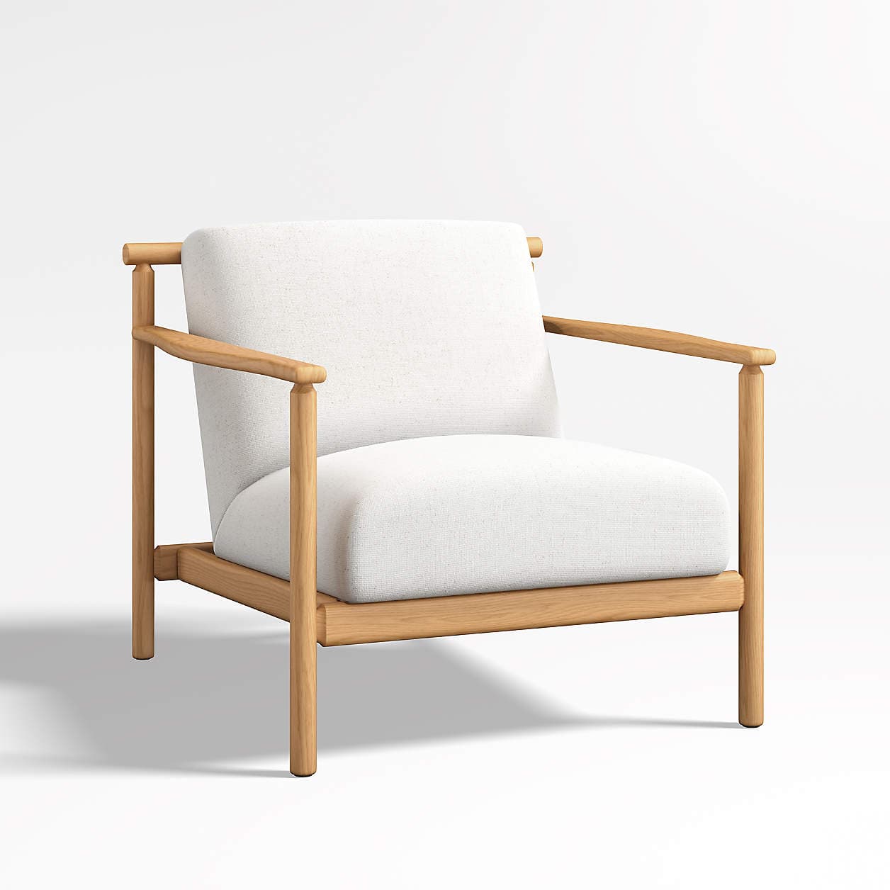 A contemporary armchair featuring a clean, minimalist design with a solid wood frame and upholstered seating and backrest. The frame is constructed from natural wood with a visible grain, showcasing a smooth finish. The seating and back cushions are covered in a textured white fabric. — 3D model