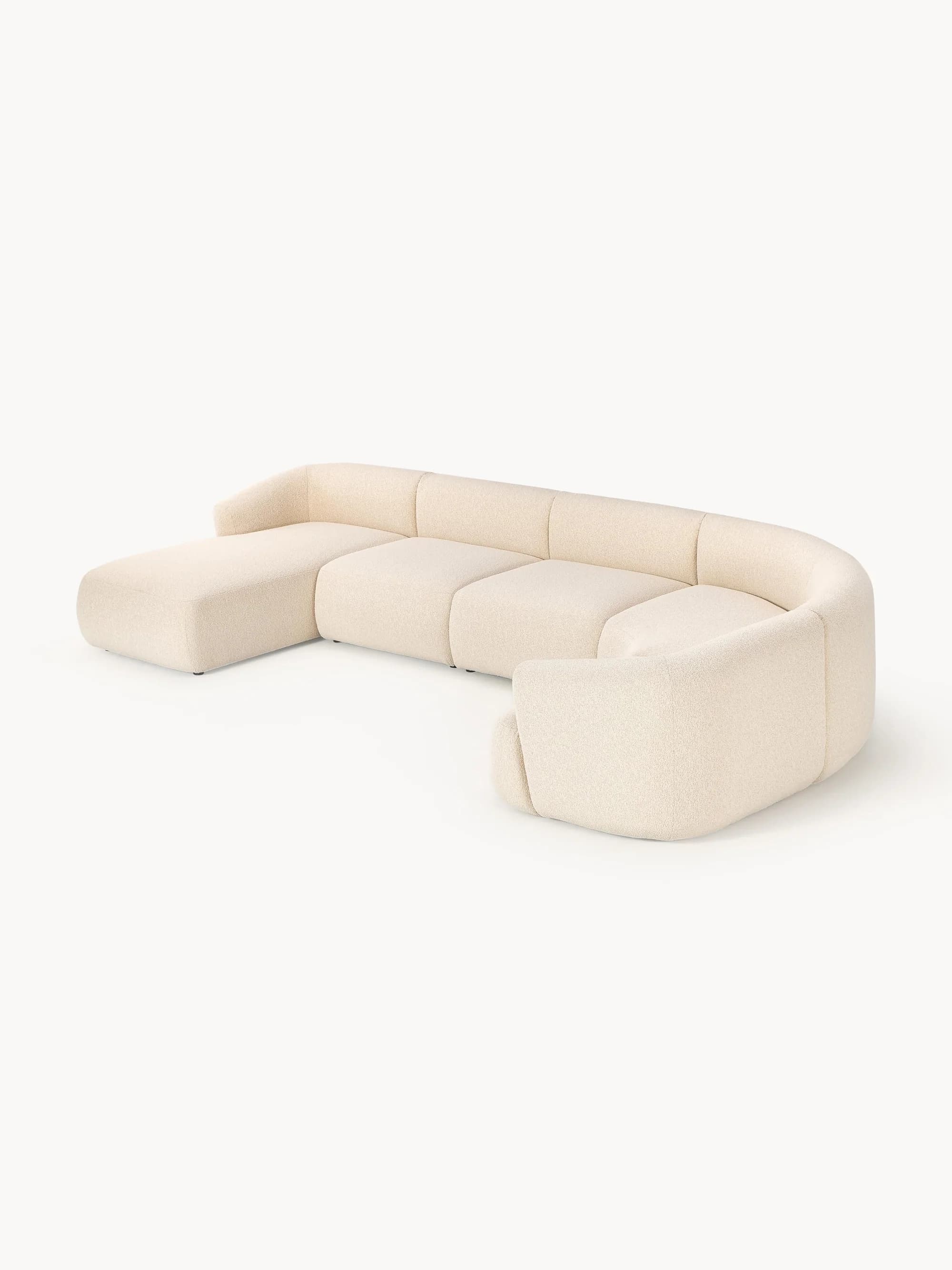 A modular sectional sofa with a curved configuration, featuring plush upholstery. The sofa is composed of multiple individual seating units that connect to form a chaise lounge on one end and a U-shaped arrangement. — 3D model