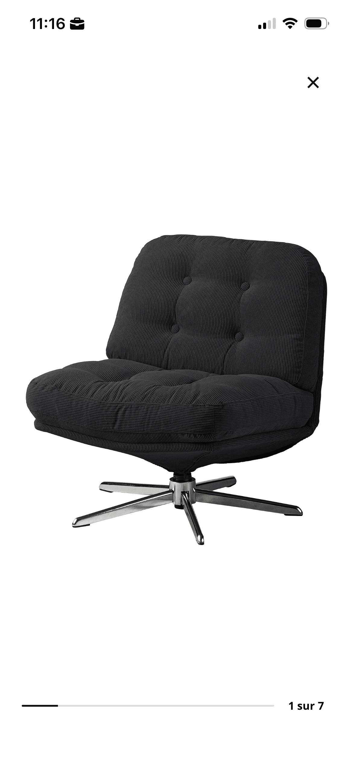 A low-profile, black corduroy upholstered lounge chair featuring a tufted back and seat, mounted on a four-star polished chrome swivel base. — 3D model