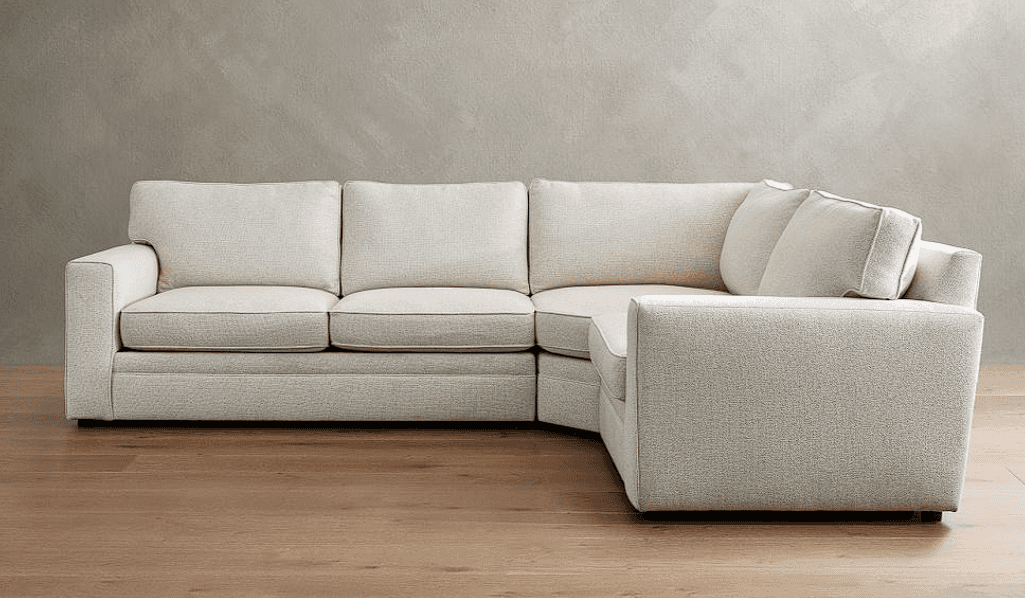 A sectional sofa with a textured, light-colored upholstery. It features a modular design with multip… — free OBJ 3D model