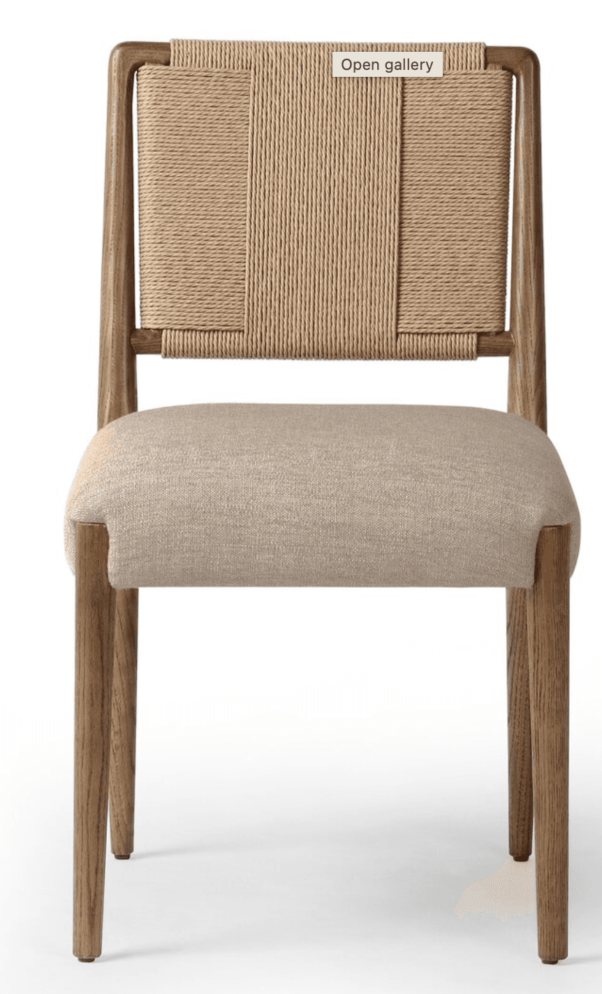 A contemporary dining chair featuring a solid wood frame, a natural woven rope backrest, and an upholstered fabric seat. — 3D model
