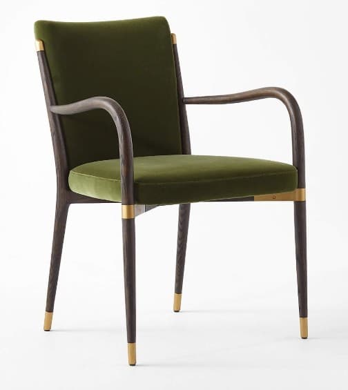 An elegant armchair featuring olive green velvet upholstery, a dark stained wooden frame, and distinctive brass accents and leg caps. — 3D model