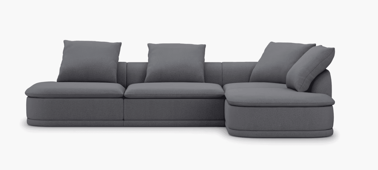A modular sectional sofa with a low profile and deep seating. It features plush cushions and a contemporary design. The sofa is upholstered in a textured dark gray fabric. — 3D model