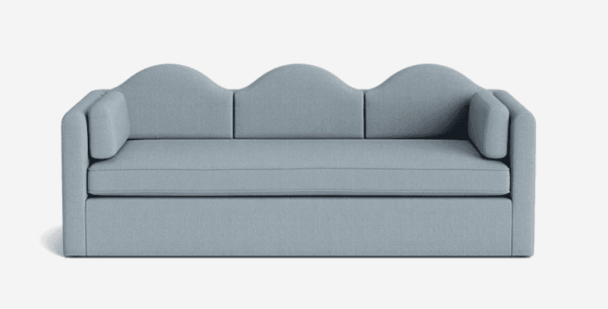 A light blue upholstered sofa with a distinctive three-arched, wavy backrest. It features three seat… — 3D model