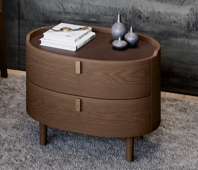 An oval-shaped nightstand with two drawers, featuring a dark wood finish and tapered legs. The top surface appears to be a darker, possibly lacquered wood or a contrasting material inset into the main body. Each drawer has a small, rectangular, light-colored handle. — 3D model