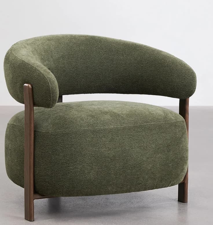 A modern lounge chair featuring a curved back and seat upholstered in olive green bouclé fabric, supported by a visible dark wood frame that forms the legs. — 3D model