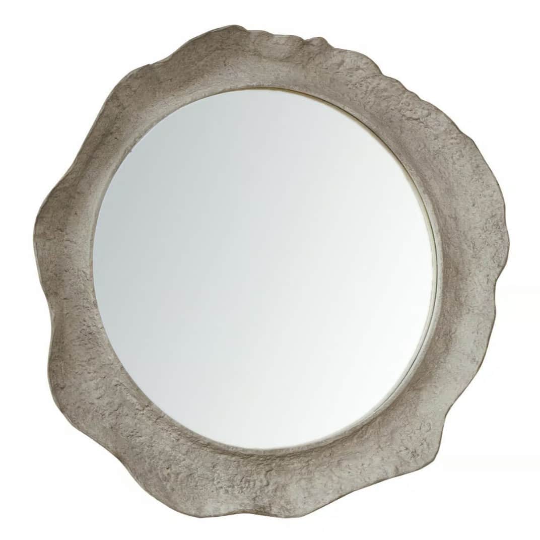 An irregularly shaped wall mirror featuring a heavily textured, organic-looking frame in a light gre… — 3D model