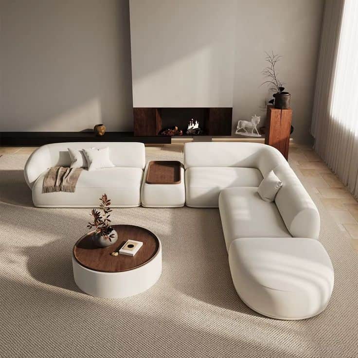 A modern modular sectional sofa in light fabric, featuring rounded contours, an integrated wooden tr… — free GLTF 3D model