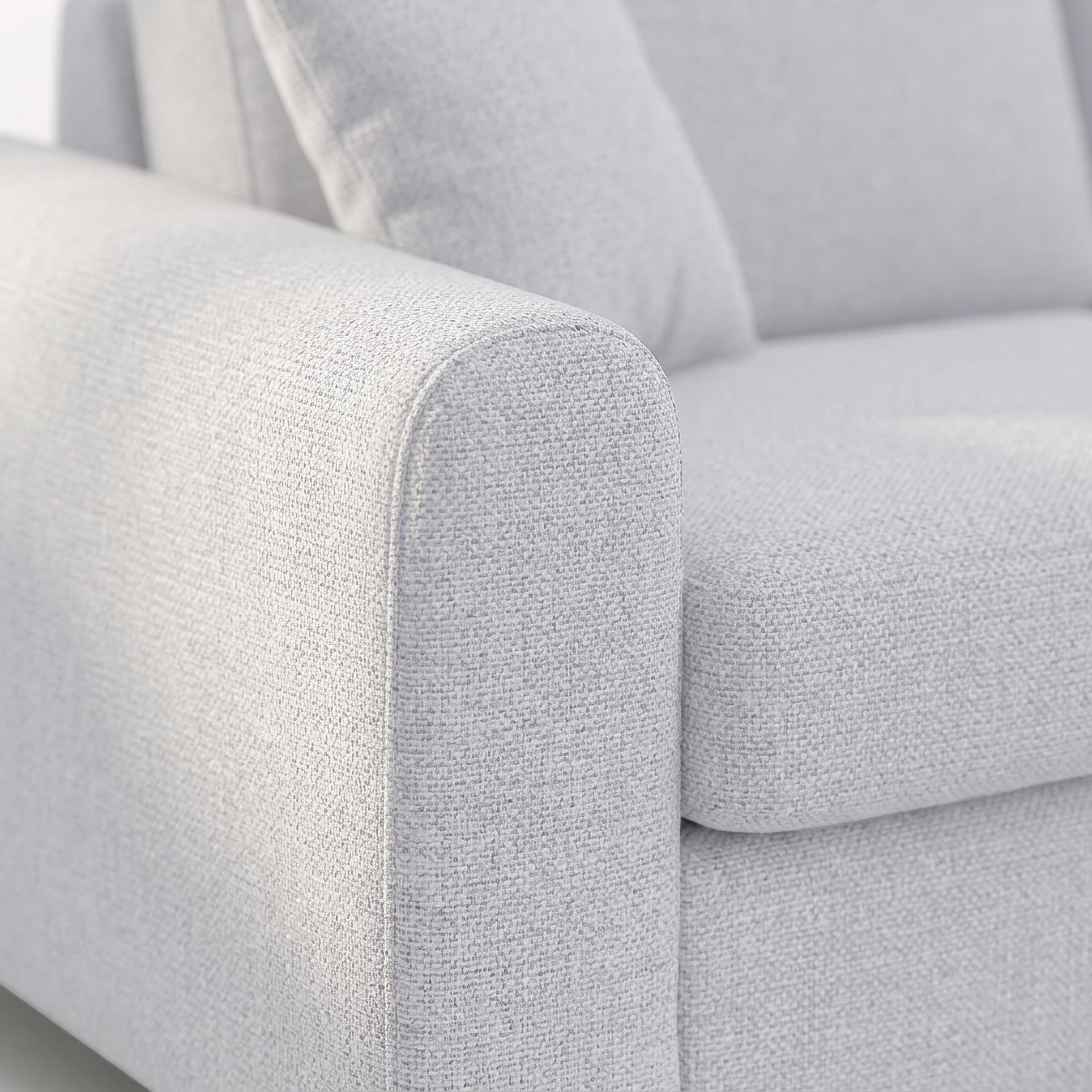 A close-up of the armrest and part of the backrest of a contemporary upholstered sofa, featuring light grey textured fabric. — 3D model