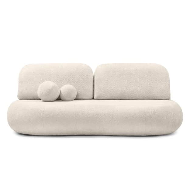 A modern, low-profile sofa with a rounded, organic form. The sofa is upholstered in a textured, bouc… — free GLTF 3D model
