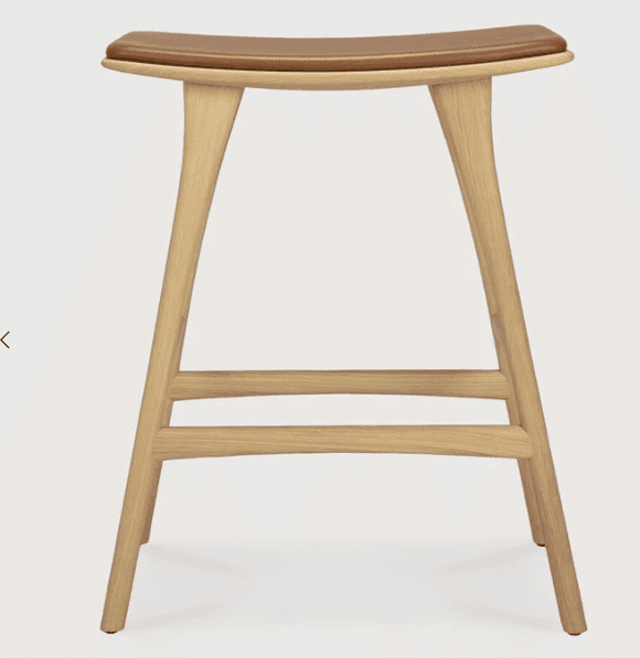 A modern bar stool featuring a solid light-colored wood frame and a contoured, saddle-shaped seat up… — 3D model