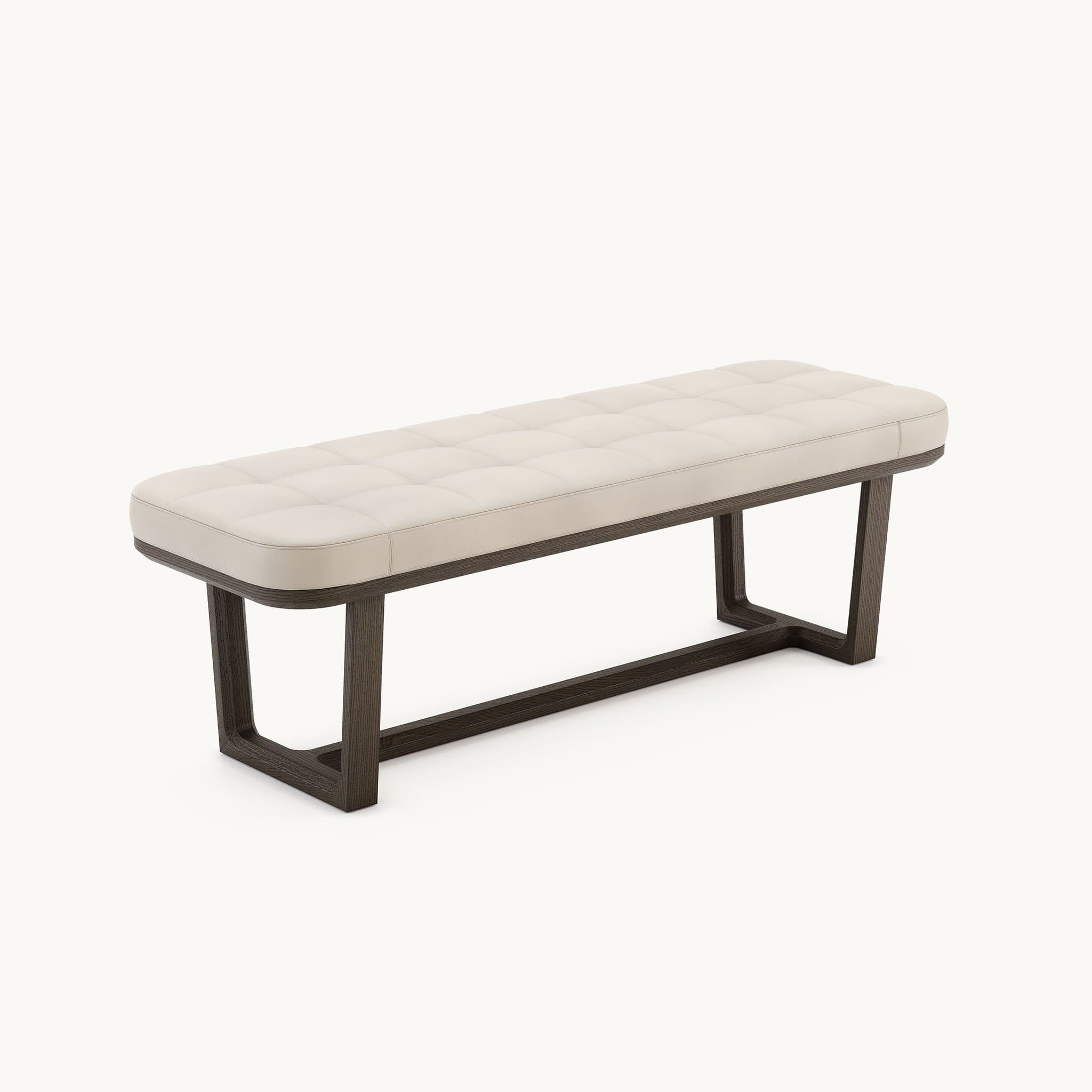 A contemporary upholstered bench with a tufted seat and a dark wood frame. The seat has a quilted pattern, and the frame has a minimalist, open design with slightly curved legs that connect to form the base and support structure. The upholstery appears to be a neutral-toned fabric or leather. — 3D model
