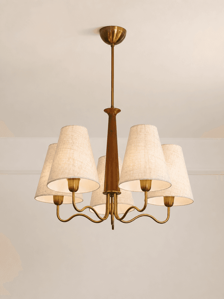 A multi-arm chandelier featuring a brass frame, a central wooden column, and five tapered fabric sha… — 3D model