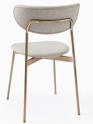 A contemporary dining chair featuring a gracefully curved, upholstered backrest and a coordinating r… — 3D model