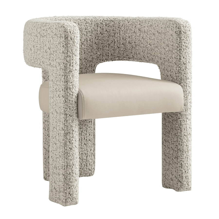 A contemporary armchair with a chunky, sculptural frame upholstered in a textured boucle-style fabric, featuring a contrasting smooth leather seat cushion. — 3D model