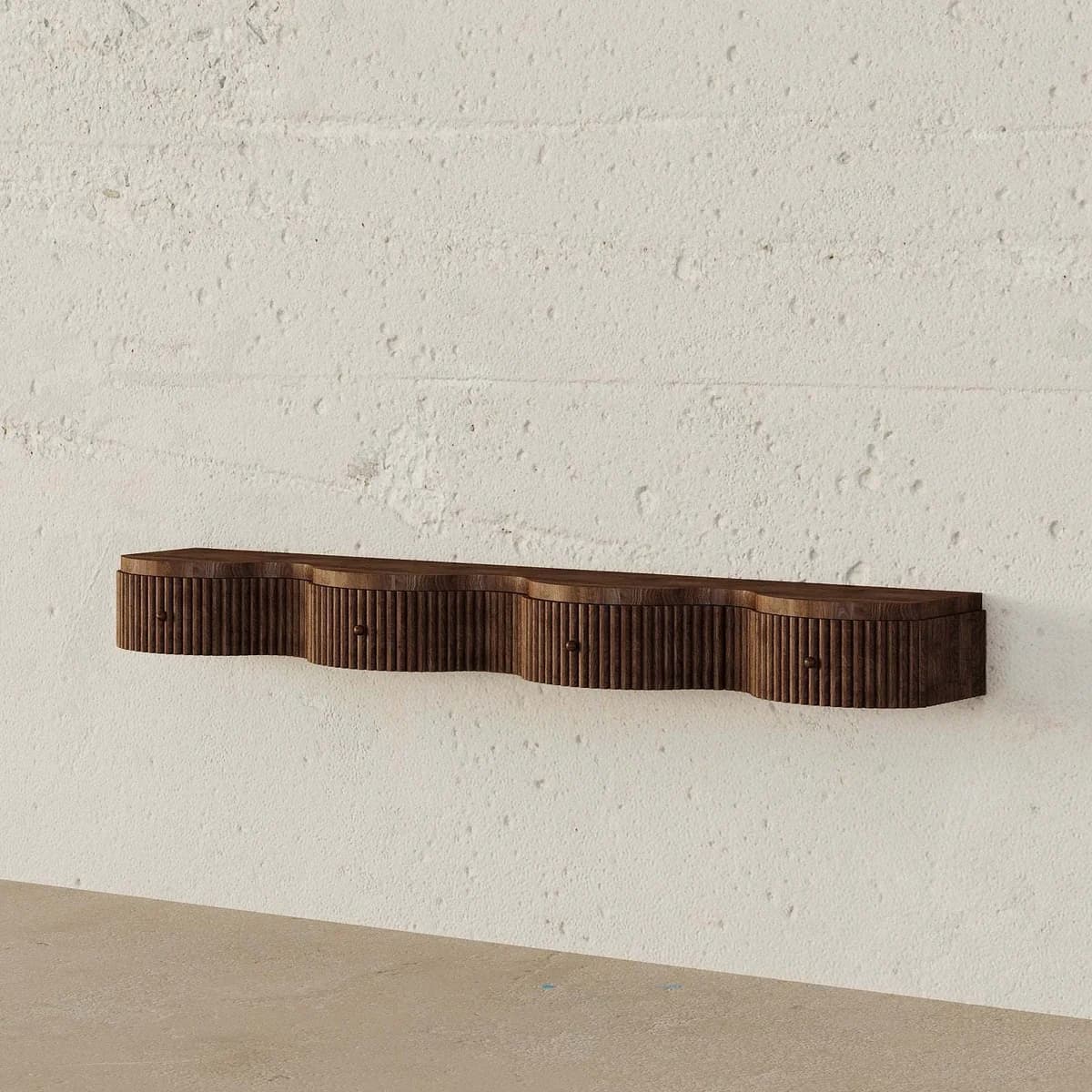 A dark brown wall-mounted console featuring a distinctive wavy front profile with vertical fluting. The unit incorporates three small drawers, each with a subtle pull knob, blending seamlessly into the overall design. The console is made of wood and is affixed to a textured white wall. — 3D model