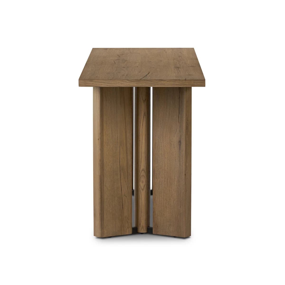 A minimalist side table constructed from solid wood, featuring a rectangular top and a base composed of thick vertical planks. The wood displays a natural grain and a medium brown finish, suggesting a rustic yet contemporary aesthetic. The base has a split, slatted design, offering a unique architectural element. — 3D model
