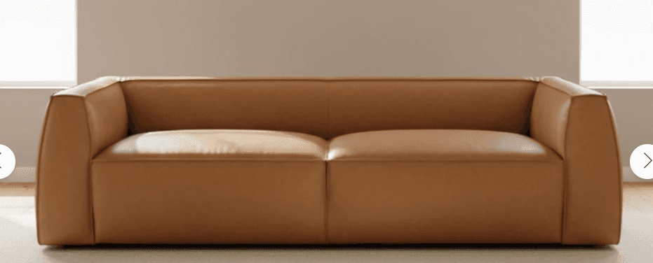 A minimalist, low-profile two-seater sofa upholstered in tan leather, featuring clean lines and inte… — free STL 3D model