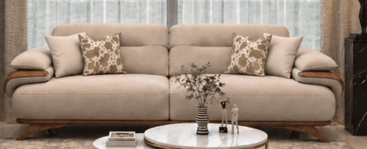 A contemporary upholstered sofa in a neutral beige fabric, featuring distinctive integrated wooden armrests and a matching curved wooden base, accompanied by decorative throw pillows. — 3D model