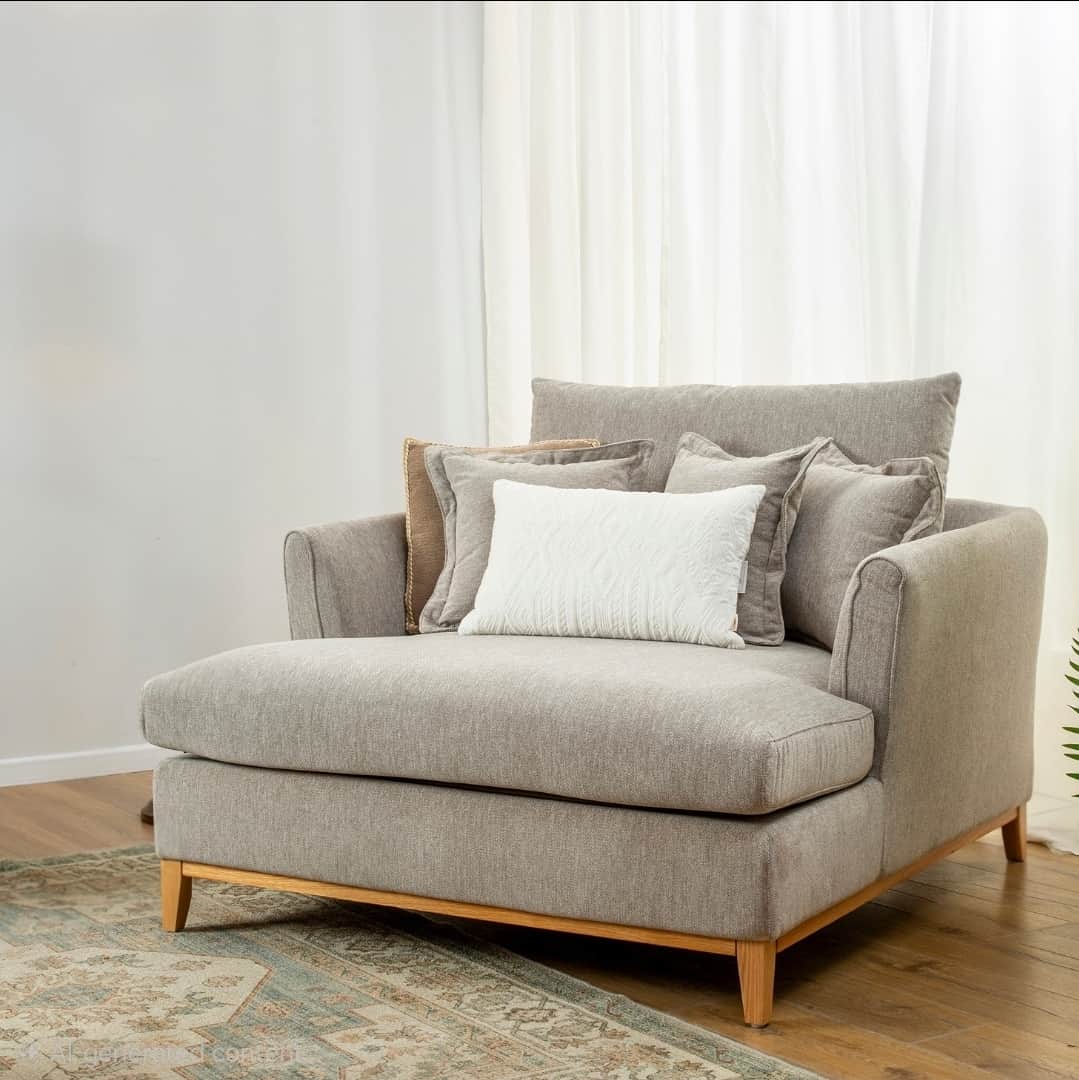 A contemporary chaise lounge featuring light gray fabric upholstery, a deep seat, and a low-profile… — 3D model