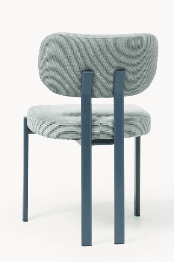 A modern chair with a slightly curved backrest and a separate seat cushion. The frame and legs are constructed from tubular metal. The upholstery is a light blue corduroy fabric. — 3D model