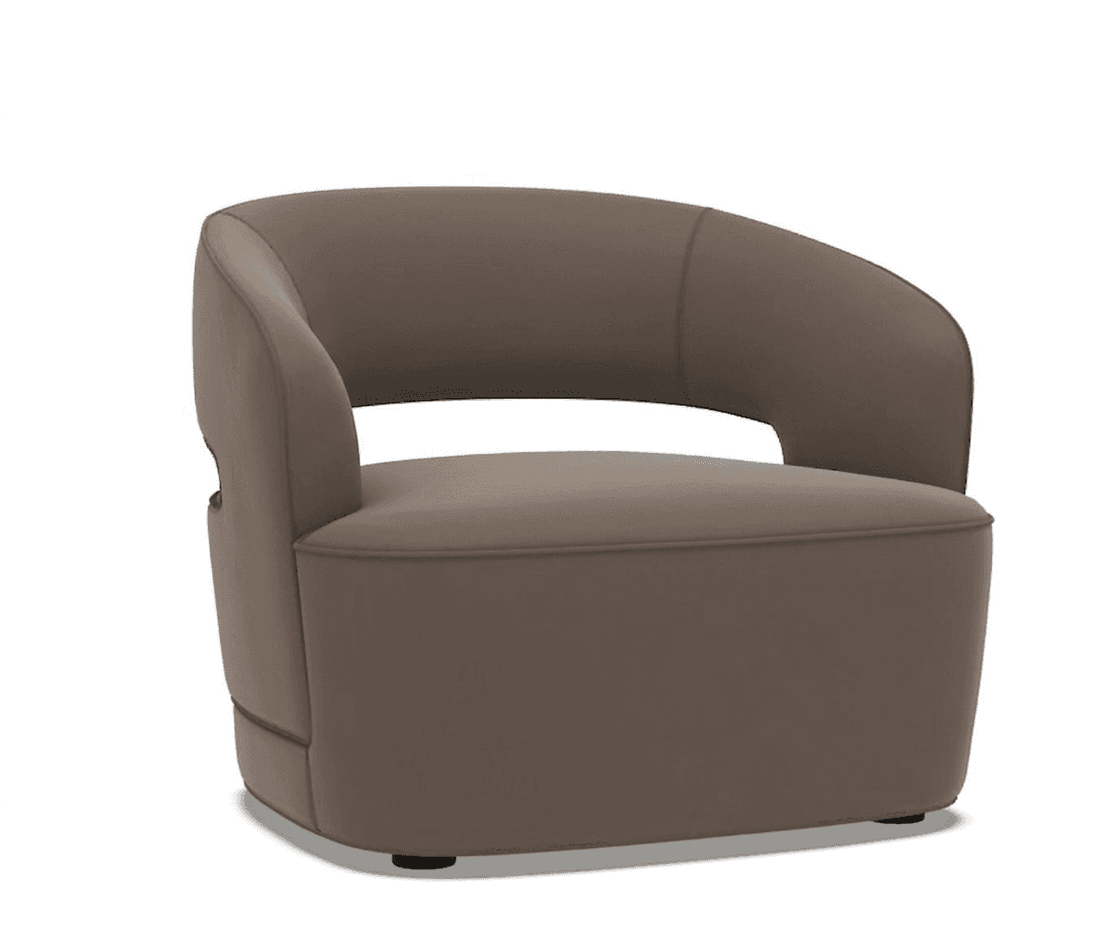 A modern, upholstered armchair with a rounded back and integrated arms. The chair has a curved silhouette, featuring a high back that flows into the armrests, creating a semi-enclosed seating area. The base is cylindrical and low-profile, with small, dark feet. The upholstery is smooth and seamless, suggesting a leather or high-quality synthetic material. The overall design is minimalist and contemporary. — 3D model