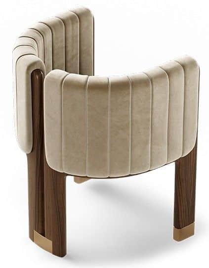 A luxurious contemporary accent chair featuring a curved, barrel-back design with integrated armrest… — free OBJ 3D model