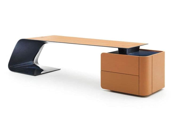 A sleek, modern desk featuring a light wood-tone rectangular top. The left side is supported by a glossy, dark, curved cantilever base. The right side rests on an integrated storage cabinet with rounded corners, finished in a tan or light brown leather-like material, and includes two drawers. The desk has a minimalist and sculptural design. — 3D model