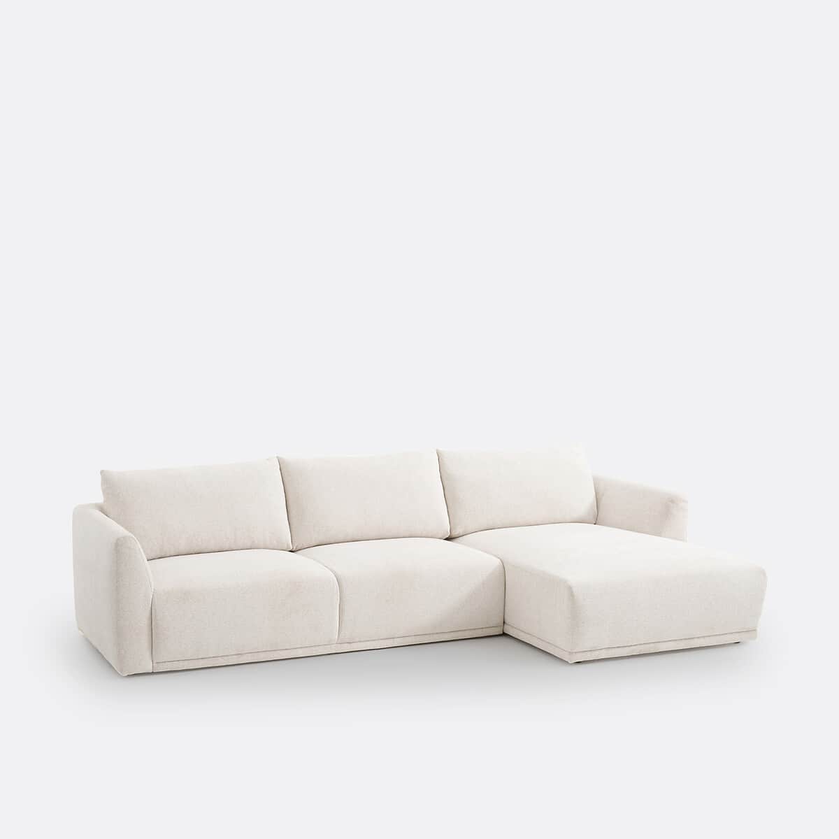 An off-white, contemporary sectional sofa featuring a main seating section and a right-hand facing c… — 3D model