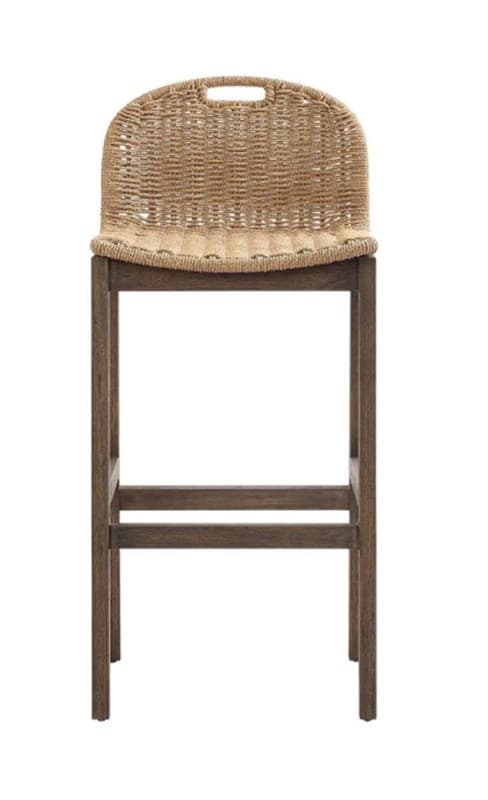 A bar stool with a woven rattan backrest and a wooden frame. The backrest is curved and features a handle at the top. The seat is integrated into the backrest structure, and the legs are straight and connected by crossbars for stability. The design appears to be for a counter or bar height setting. — 3D model
