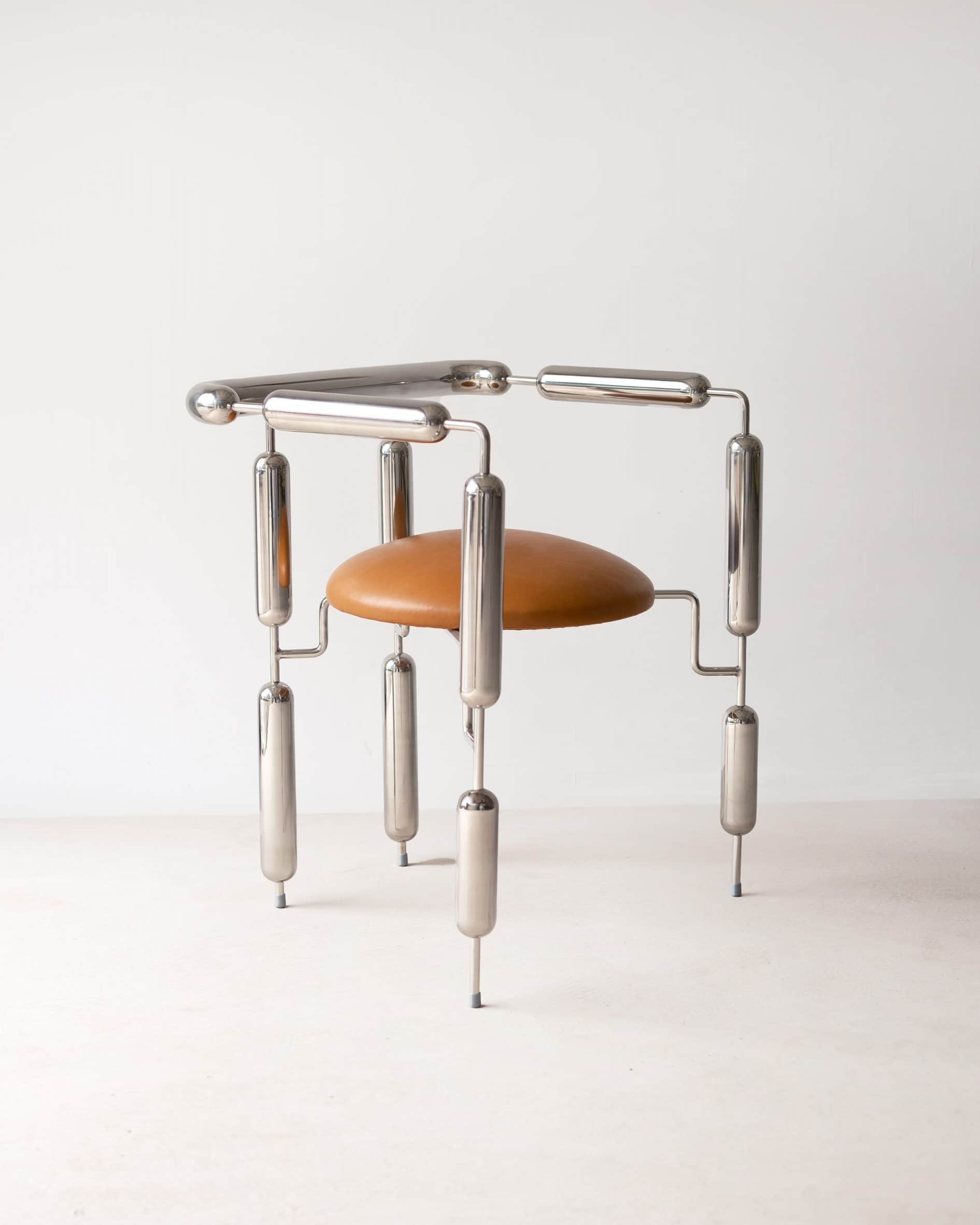 A striking postmodern accent chair featuring a highly polished tubular chrome frame and a circular,… — 3D model