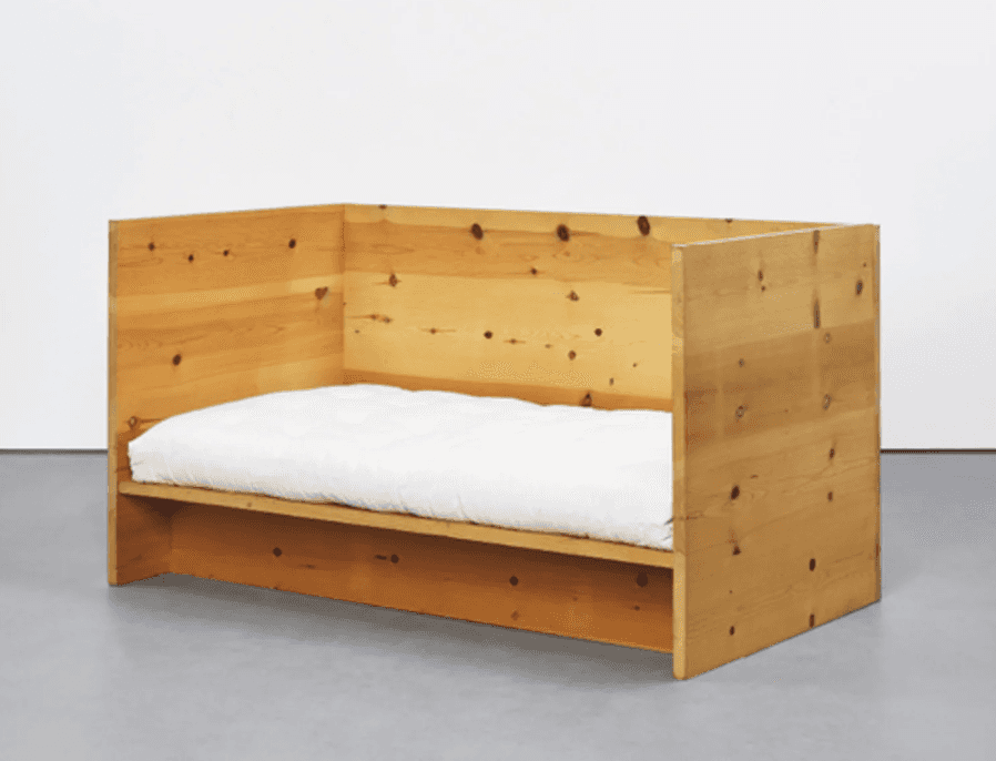 A minimalist daybed constructed from light-colored pine wood, featuring a low platform base and inte… — 3D model
