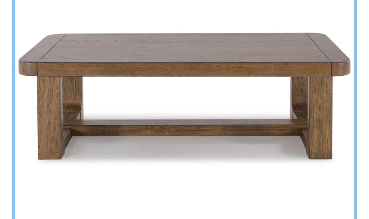 A rectangular wooden coffee table featuring a sturdy construction with thick block legs and an integ… — 3D model