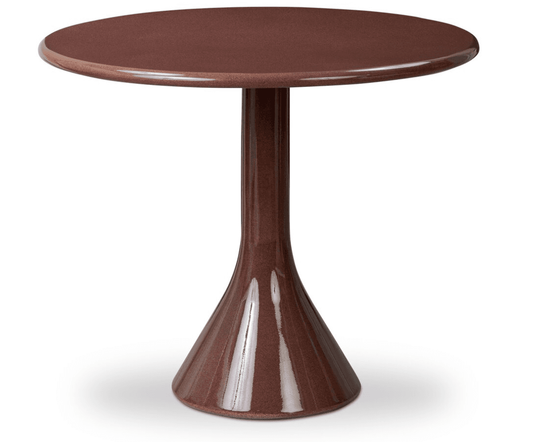 A modern pedestal accent table featuring a round tabletop and a single, central pedestal base that flares conically towards the floor. The table exhibits a reddish-brown, terracotta-like color with a subtle speckled or granular glazed finish, giving it a tactile appearance. Its minimalist form and uniform color contribute to a contemporary aesthetic. — 3D model