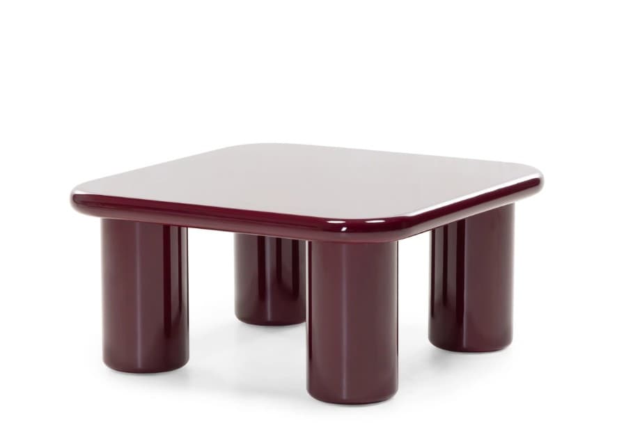 A square coffee table with rounded edges and four cylindrical legs. The table has a glossy finish. — 3D model