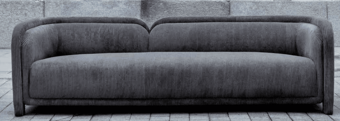 A contemporary sofa upholstered in a dark charcoal grey ribbed fabric, featuring soft, rounded arms and a two-cushion backrest. The seat cushion is a single, continuous piece, and the sofa has a low-profile, integrated upholstered base. — 3D model