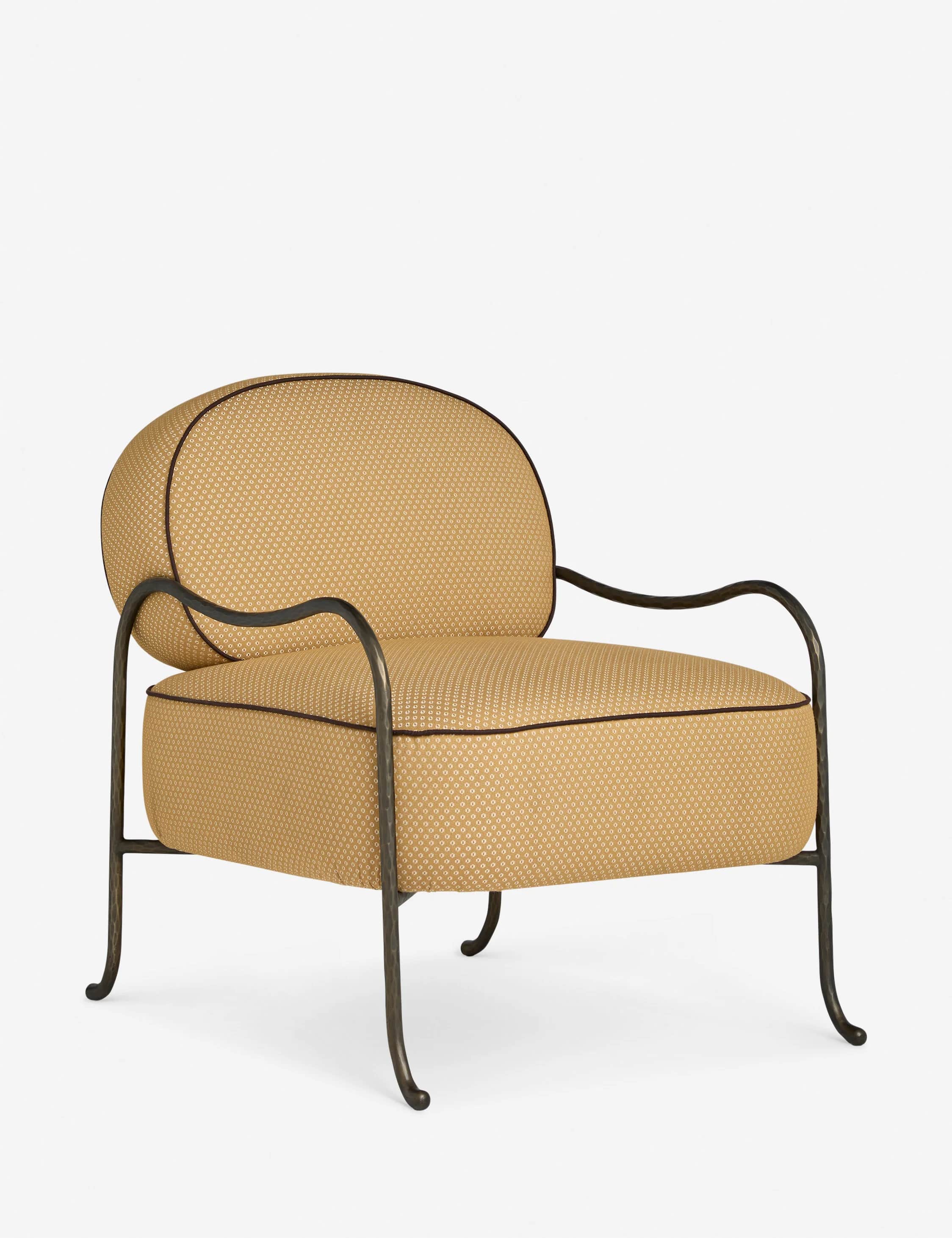 An upholstered armchair featuring a dark, curved metal frame with a distressed finish. The seat and… — 3D model