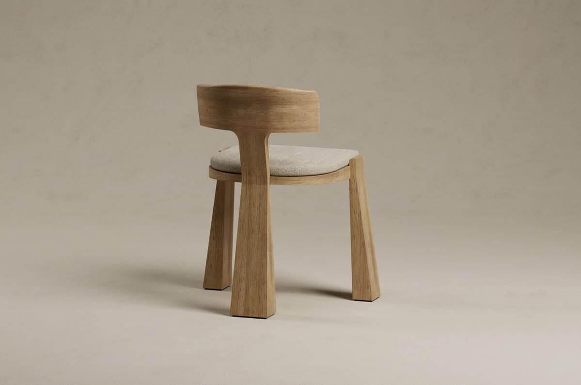 A modern wooden chair featuring a minimalist design. It has a light-colored wood frame with thick, angular, and tapered legs. The backrest is integrated into the frame, curving gently to offer support, and it is complemented by a light-colored, padded fabric seat cushion. The chair's aesthetic is clean and contemporary. — 3D model