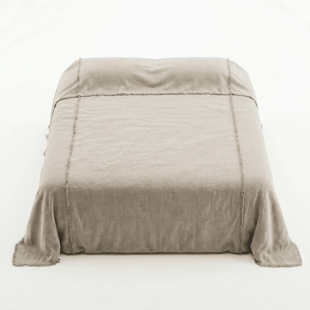 A bed with a taupe-colored duvet or comforter that appears to be made of linen. The bedding has a raw, frayed edge detail along the seams and the overhang. — 3D model