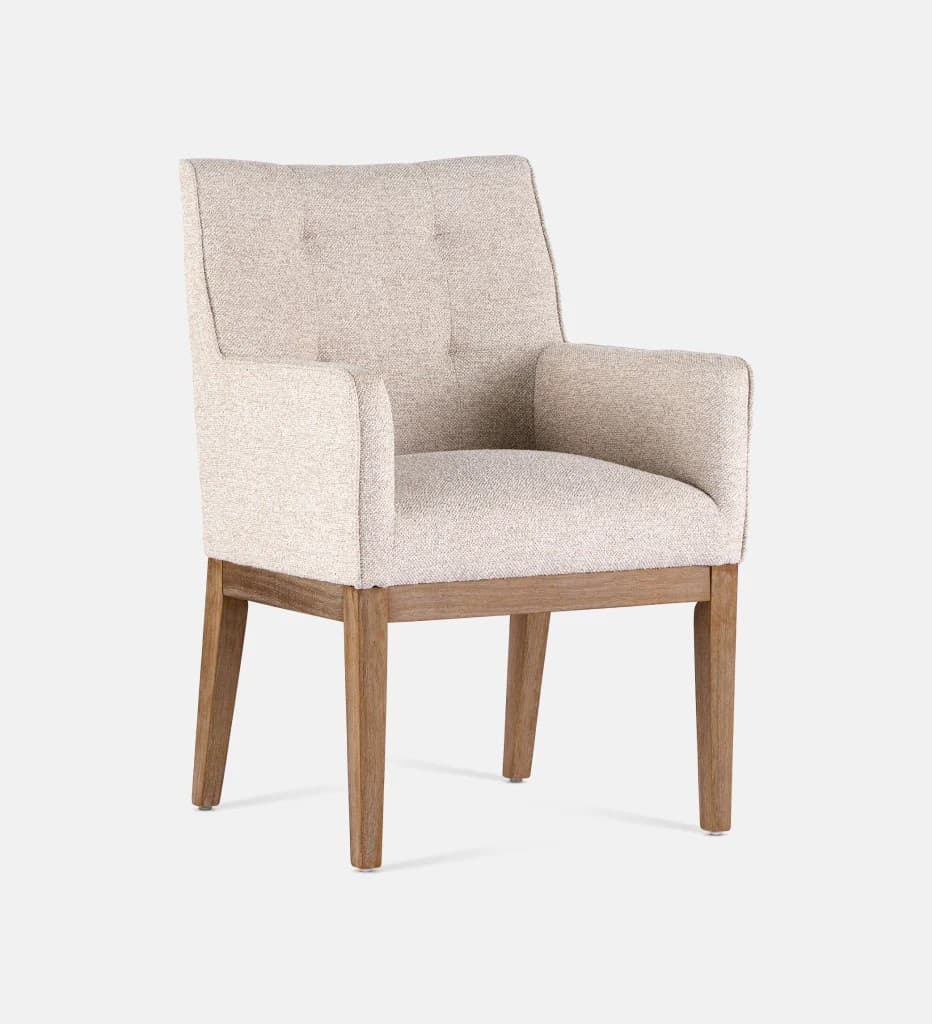 A fabric-upholstered armchair with a tufted backrest and wooden legs. The armchair features a slightly curved back and armrests that blend into the seat. — 3D model