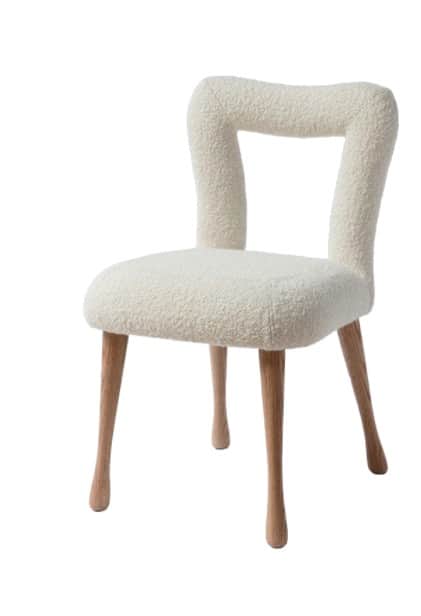 A modern armless chair with a distinctive open, U-shaped backrest, upholstered entirely in textured… — free STL 3D model