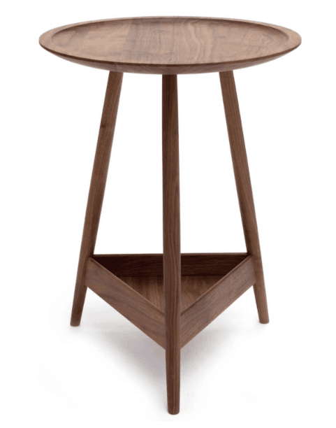 A modern minimalist side table crafted entirely from dark brown walnut wood, featuring a round tray-style top with a raised edge. It stands on three slender, tapered legs that form a tripod base, connected by a triangular lower shelf. — 3D model