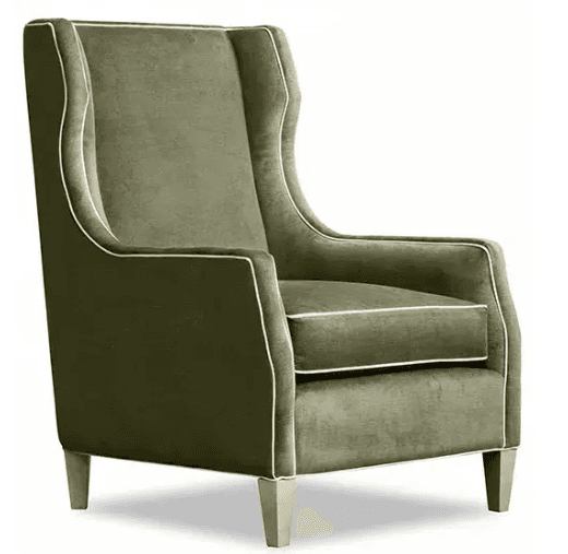An upholstered wingback armchair in a deep olive green velvet-like fabric. It features a high back with distinctive side wings, rolled arms, and a single seat cushion, all outlined with contrasting white piping. The chair is supported by four light-colored, tapered wooden legs. — 3D model