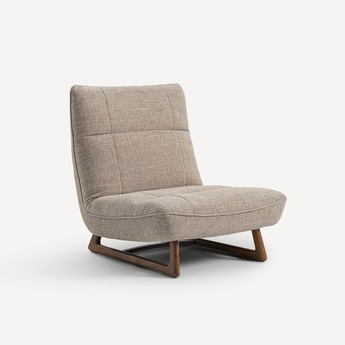 A modern armchair with a low profile and a sloped backrest. The armchair features upholstered seatin… — free OBJ 3D model